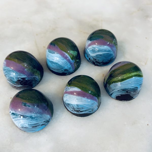 hand painted chocolates in blue marble design