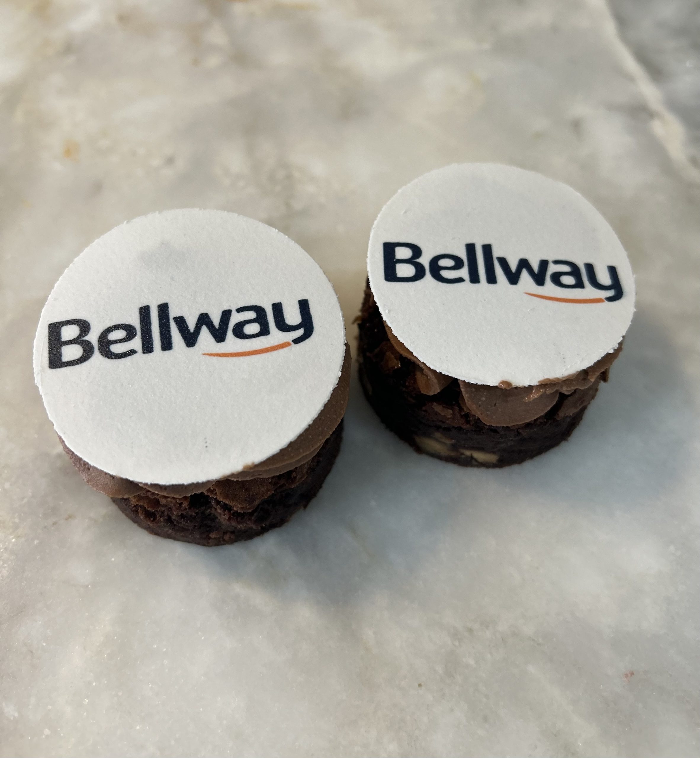 branded cupcake with bellway logo